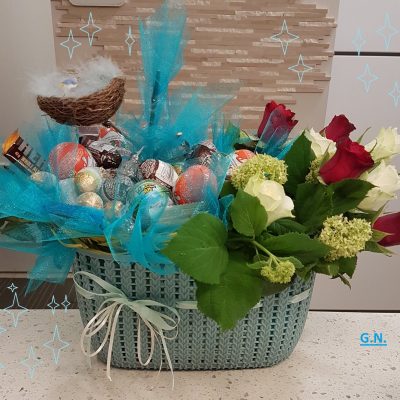 Sweet arrangement in basket.